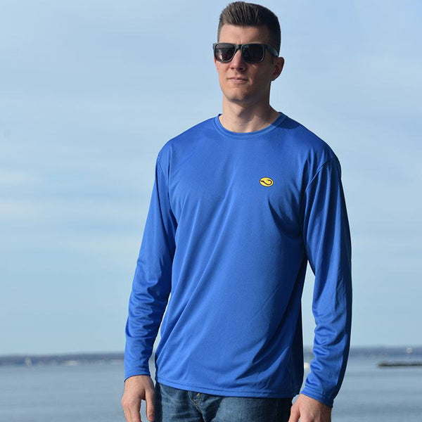young man in royal blue Sun Water performance fishing shirt by Hook Life