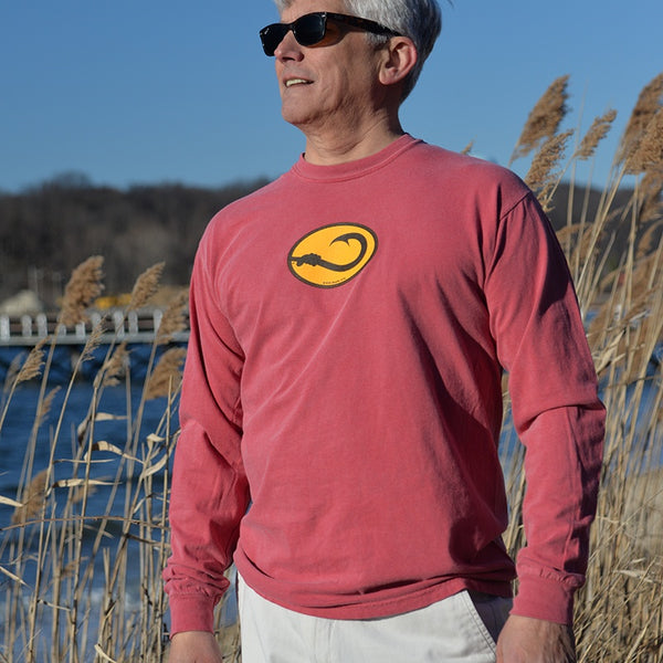 man in red long sleeve Anglers Pride tee shirt by Hook Life on the beach