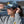 Load image into Gallery viewer, young woman wearing Water Camo fishing cap by Hook Life at a harbor
