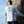 Load image into Gallery viewer, young man climbing seawall in white performance fishing shirt by Hook Life
