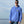 Load image into Gallery viewer, young man in blue Hookie fishing hoodie sweatshirt on sea wall
