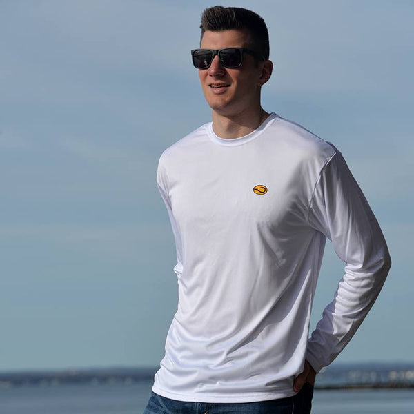 young man in white Sun Water performance fishing shirt by Hook Life